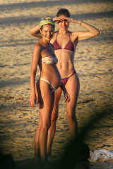 Pregnant CANDICE SWANEPOEL and DOUTZEN KROES in Bikinis at a Beach in Bahia фото №1029533