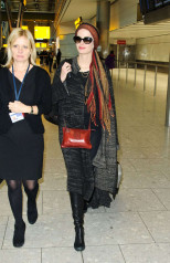 Eva Green - at Heathrow airport in London фото №975009