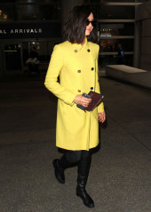 Nina Dobrev – Arriving at Los Angeles International Airport фото №939871