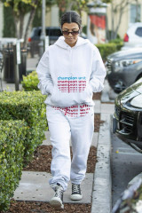 Kourtney Kardashian in Grey Sweatsuit Hoodie, Black High-Top Sneakers and Dark S фото №1123030