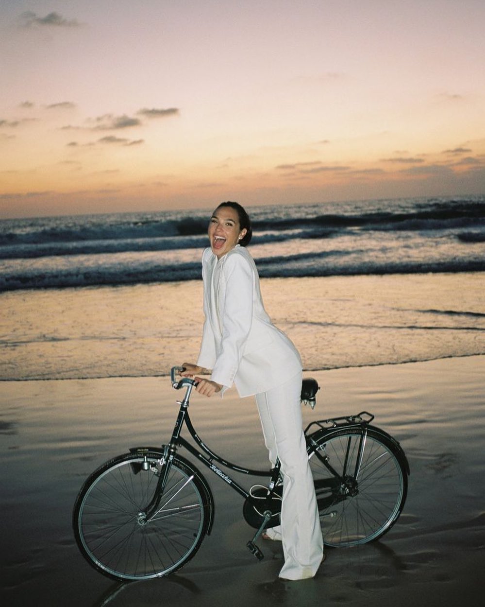 Three of my favs - the beach, sunsets and riding bikes in a suit ????